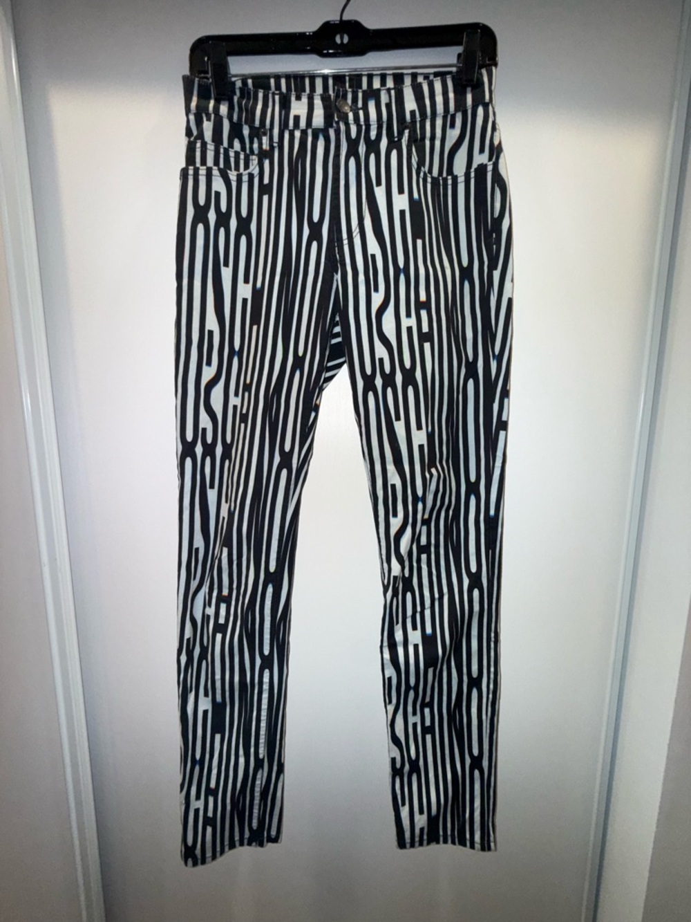 Moschino Black and White Vertical Stripe Pants with Subtle Color Accents